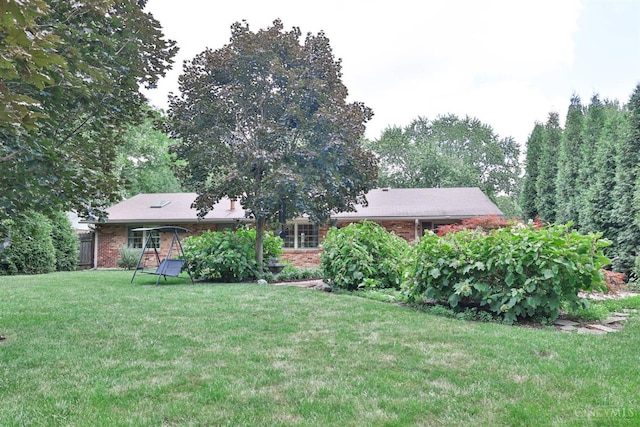 6341 Marshall Rd, Centerville, OH 45459 - back of property with brick siding and a yard