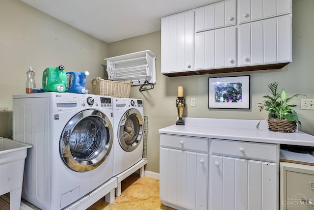 6341 Marshall Rd, Centerville, OH 45459 - laundry area featuring cabinet space and washer and clothes dryer