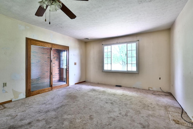 17403 Bloomrose Rd, Sterling Twp, OH 45176 - carpeted spare room featuring a textured ceiling and a ceiling fan