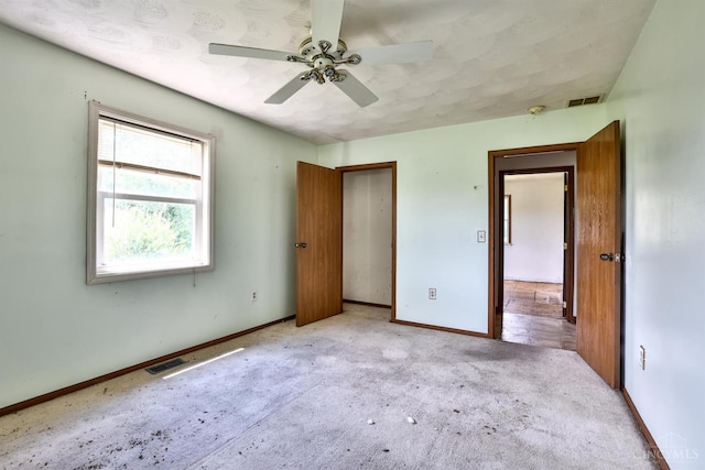 17403 Bloomrose Rd, Sterling Twp, OH 45176 - unfurnished bedroom with carpet floors and a ceiling fan