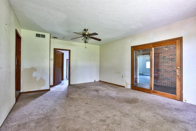 17403 Bloomrose Rd, Sterling Twp, OH 45176 - empty room with a ceiling fan, a textured ceiling, and carpet flooring