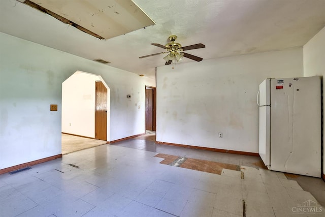 17403 Bloomrose Rd, Sterling Twp, OH 45176 - unfurnished room with ceiling fan, tile patterned floors, and arched walkways