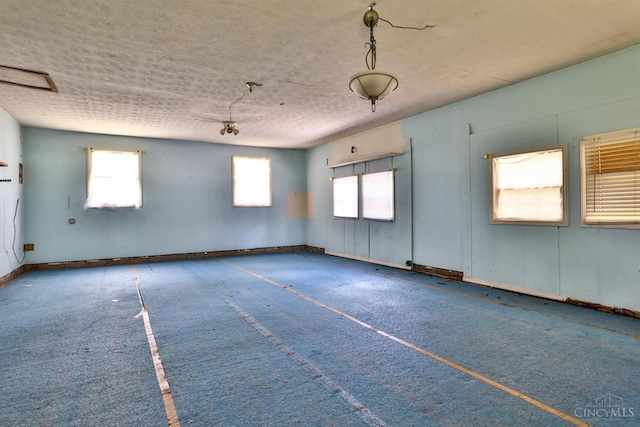 17403 Bloomrose Rd, Sterling Twp, OH 45176 - carpeted spare room featuring healthy amount of natural light and a textured ceiling