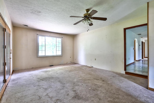 17403 Bloomrose Rd, Sterling Twp, OH 45176 - carpeted spare room featuring a textured ceiling and a ceiling fan