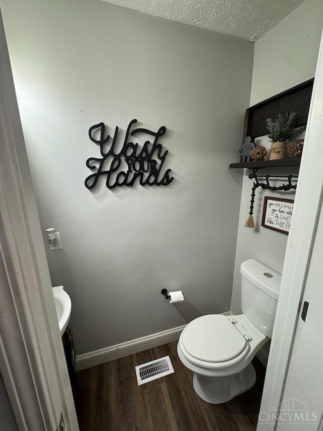 8091 Celestial Cir, Liberty Twp, OH 45044 - bathroom featuring wood finished floors and a textured ceiling