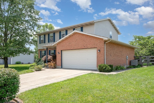 6409 Stapleton Ct, Fairfield Twp, OH 45011 - view of front of home featuring brick siding, a garage, and driveway