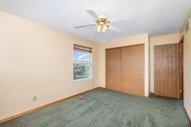 6409 Stapleton Ct, Fairfield Twp, OH 45011 - unfurnished bedroom featuring carpet floors, a textured ceiling, and a ceiling fan