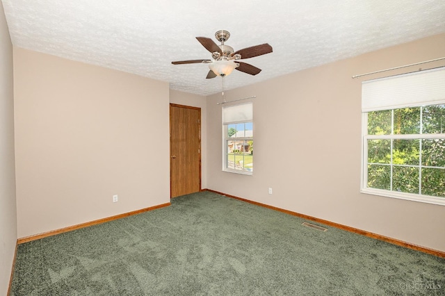6409 Stapleton Ct, Fairfield Twp, OH 45011 - carpeted empty room featuring ceiling fan and a textured ceiling