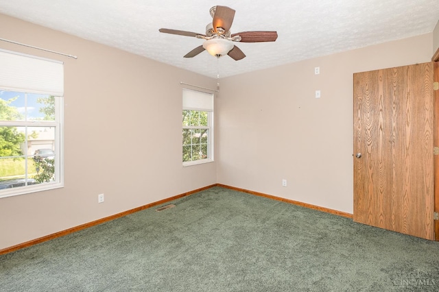 6409 Stapleton Ct, Fairfield Twp, OH 45011 - unfurnished room featuring carpet flooring, a ceiling fan, and a textured ceiling