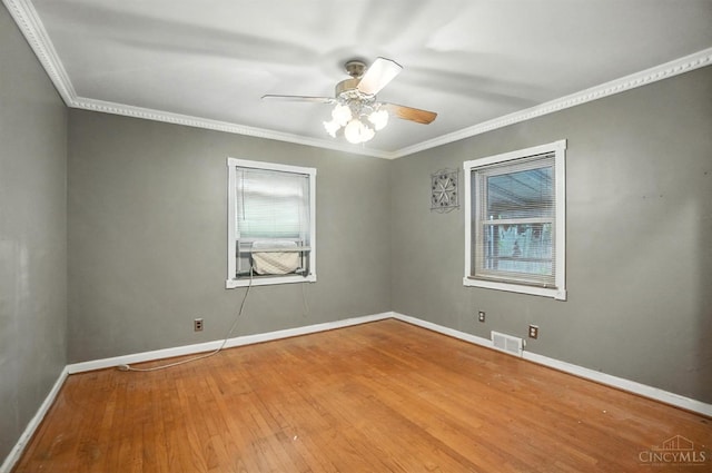 3760 Feldkamp Ave, Green Twp, OH 45211 - unfurnished room with a ceiling fan, wood finished floors, and crown molding