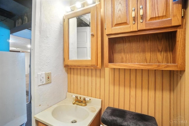 3760 Feldkamp Ave, Green Twp, OH 45211 - bathroom with vanity and a textured wall