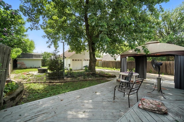 3760 Feldkamp Ave, Green Twp, OH 45211 - wooden deck featuring a gazebo and a fenced backyard