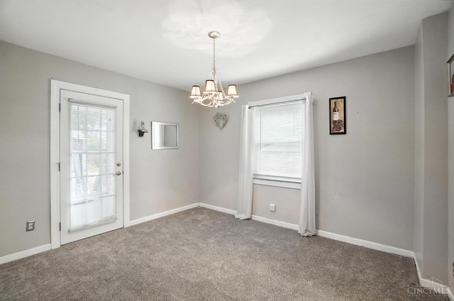 3760 Feldkamp Ave, Green Twp, OH 45211 - carpeted empty room featuring a chandelier and baseboards