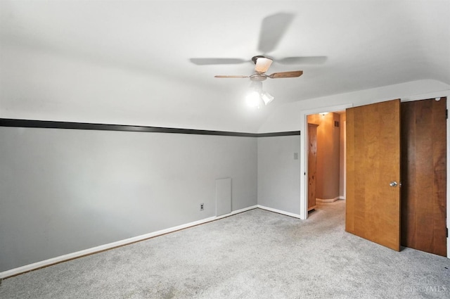 3760 Feldkamp Ave, Green Twp, OH 45211 - unfurnished bedroom featuring carpet floors, lofted ceiling, and a ceiling fan