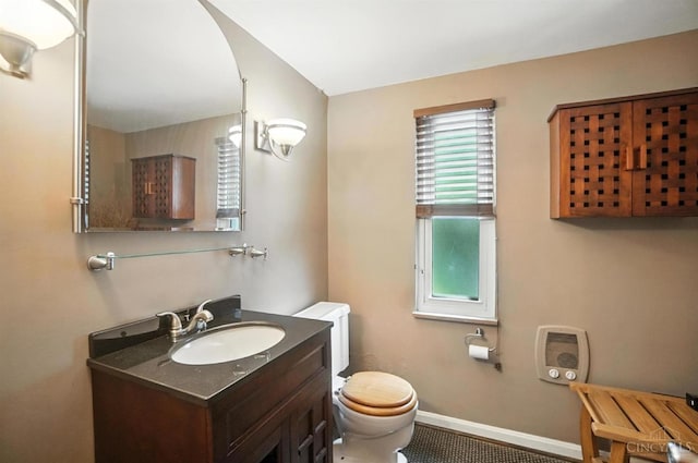 3760 Feldkamp Ave, Green Twp, OH 45211 - bathroom with healthy amount of natural light, vanity, and heating unit