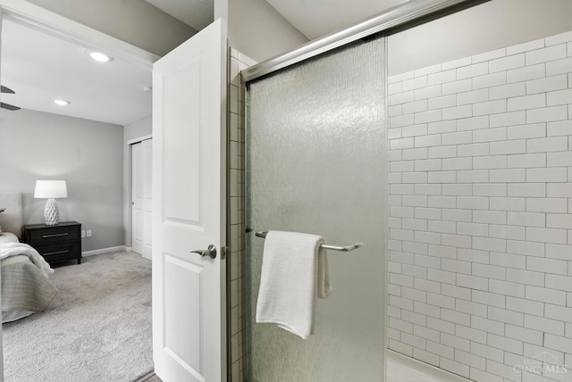 1545 Ruth Ave, Cincinnati, OH 45207 - ensuite bathroom with tiled shower, recessed lighting, and a ceiling fan