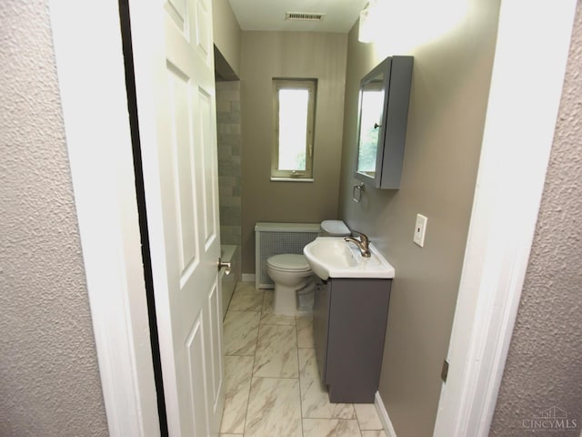 3527 Reemelin Rd, Green Twp, OH 45211 - bathroom featuring vanity and marble look tile flooring