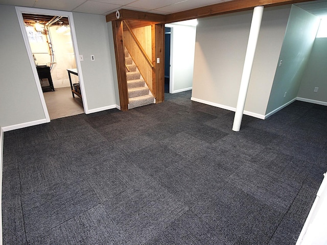 3527 Reemelin Rd, Green Twp, OH 45211 - finished below grade area featuring stairway and dark colored carpet
