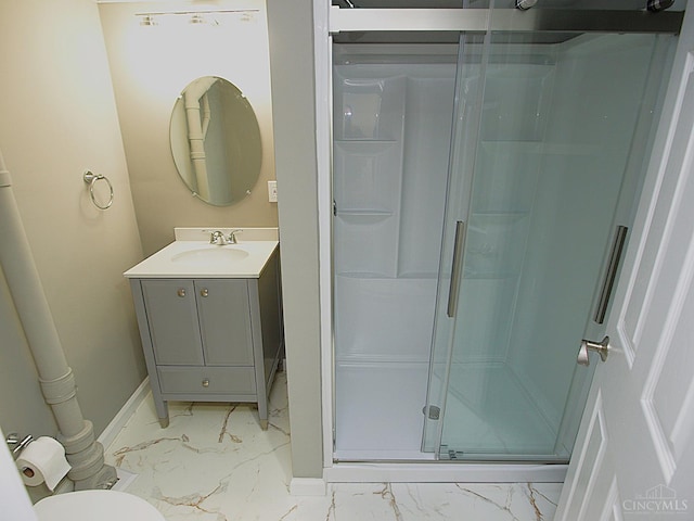 3527 Reemelin Rd, Green Twp, OH 45211 - full bath featuring marble look tiles, a stall shower, and vanity