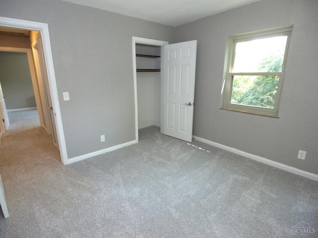 3527 Reemelin Rd, Green Twp, OH 45211 - unfurnished bedroom featuring carpet and a closet