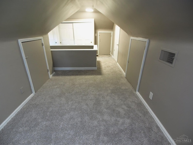 3527 Reemelin Rd, Green Twp, OH 45211 - additional living space featuring light colored carpet and lofted ceiling
