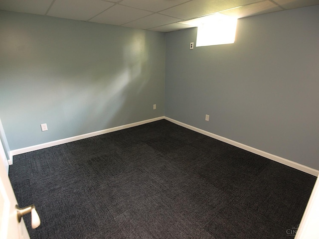 3527 Reemelin Rd, Green Twp, OH 45211 - basement featuring a paneled ceiling and dark carpet
