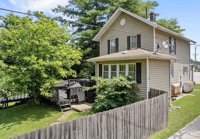 122 Fairview Ave, Washington Twp, OH 45171 - view of front of property with a chimney, a deck, and oil tank