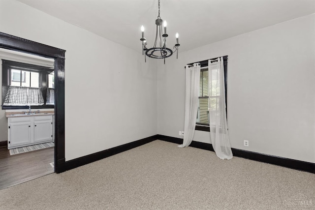122 Fairview Ave, Washington Twp, OH 45171 - spare room with a chandelier and a sink