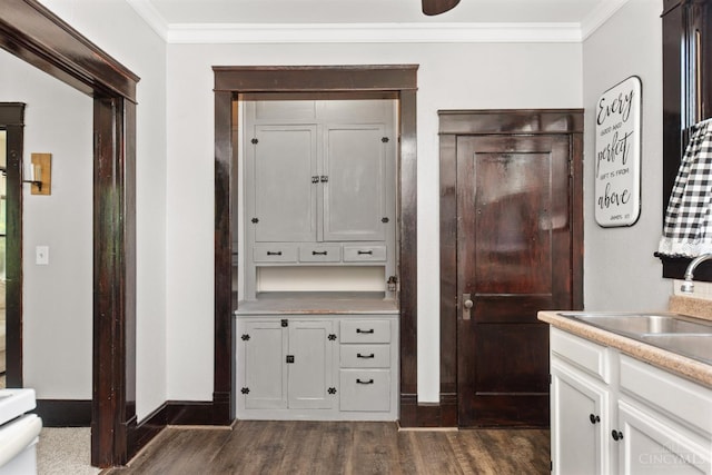 122 Fairview Ave, Washington Twp, OH 45171 - kitchen featuring dark wood finished floors, ornamental molding, white cabinetry, and light countertops