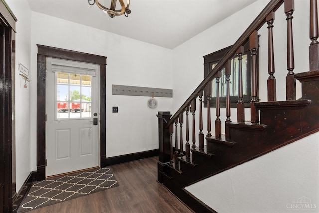122 Fairview Ave, Washington Twp, OH 45171 - foyer featuring dark wood-style floors, stairs, and a chandelier