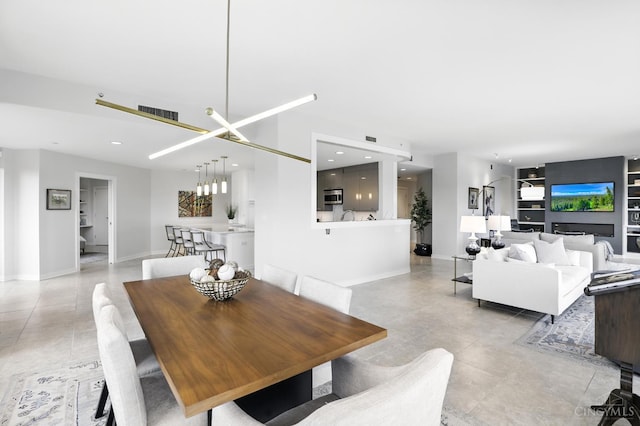 1201 Edgecliff Pl Unit 1083, Cincinnati, OH 45206 - dining space featuring light tile patterned floors, recessed lighting, and built in features