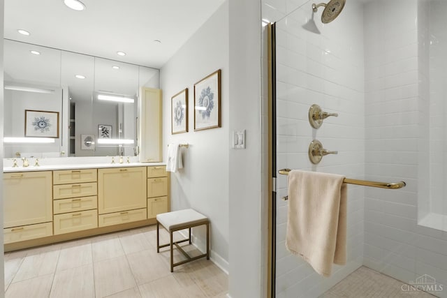 1201 Edgecliff Pl Unit 1083, Cincinnati, OH 45206 - bathroom featuring a stall shower, double vanity, recessed lighting, and tile patterned flooring
