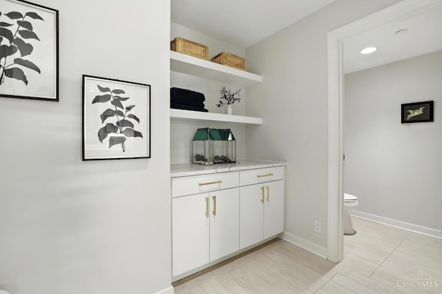 1201 Edgecliff Pl Unit 1083, Cincinnati, OH 45206 - bar with baseboards and recessed lighting
