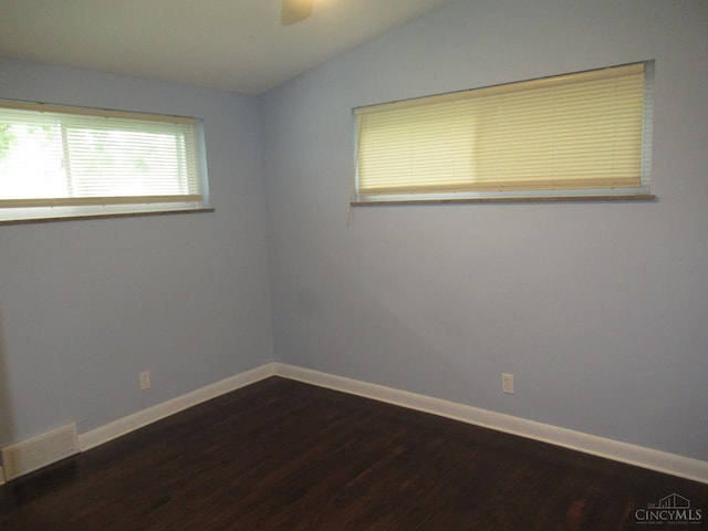 8608 Long Ln, Springfield Twp, OH 45231 - empty room featuring vaulted ceiling, dark wood finished floors, and ceiling fan