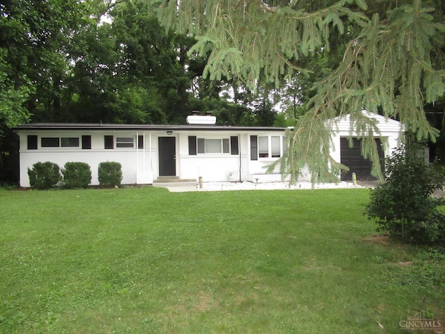 8608 Long Ln, Springfield Twp, OH 45231 - ranch-style home with a front lawn, a chimney, and entry steps