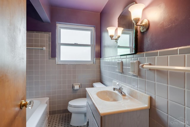 6537 Craigland Ct, Cincinnati, OH 45230 - full bath featuring tile walls, vanity, tile patterned flooring, and wainscoting