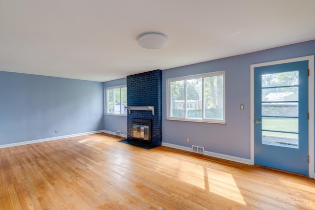 6537 Craigland Ct, Cincinnati, OH 45230 - unfurnished living room with light wood-type flooring and a fireplace