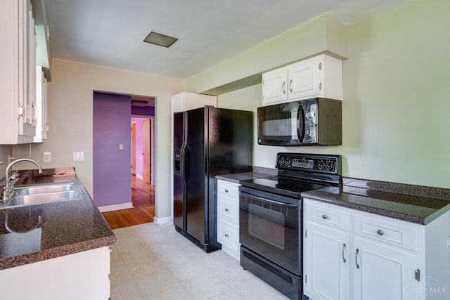 6537 Craigland Ct, Cincinnati, OH 45230 - kitchen with black appliances, dark countertops, and white cabinets