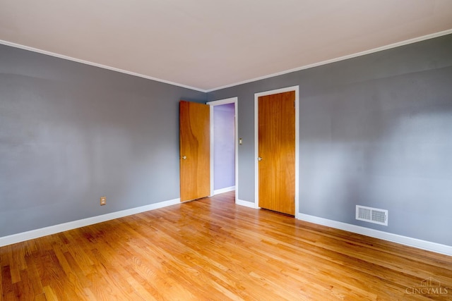 6537 Craigland Ct, Cincinnati, OH 45230 - unfurnished room with light wood-style floors and crown molding