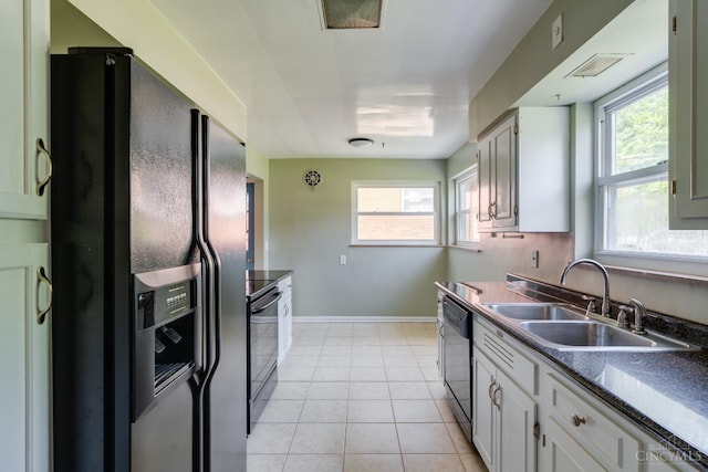 6537 Craigland Ct, Cincinnati, OH 45230 - kitchen featuring refrigerator with ice dispenser, dishwashing machine, dark countertops, black electric range oven, and white cabinets