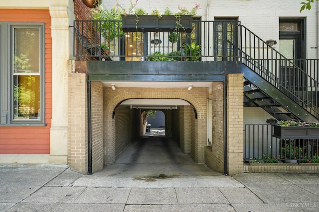 1236 Louden St, Cincinnati, OH 45202 - doorway to property with brick siding and concrete driveway