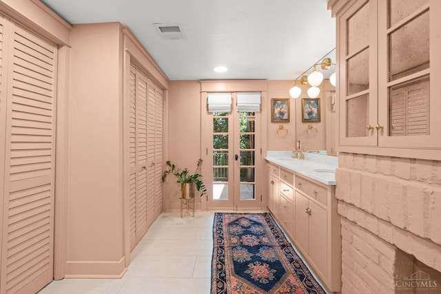 1236 Louden St, Cincinnati, OH 45202 - bathroom featuring a closet, double vanity, and recessed lighting
