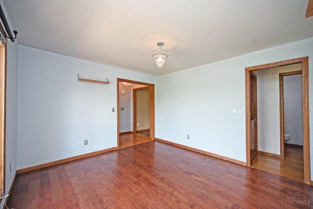 8424 Oak Grove Rd, Georgetown, OH 45121 - spare room with wood finished floors and baseboards