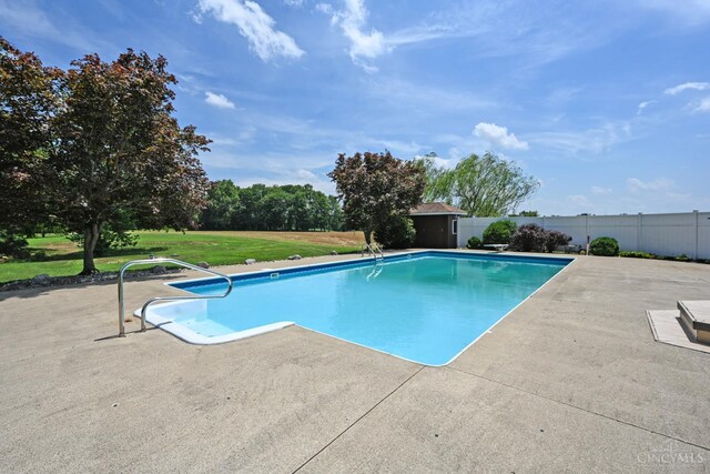 8424 Oak Grove Rd, Georgetown, OH 45121 - view of swimming pool featuring a patio area and a storage unit