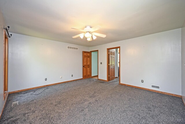 8424 Oak Grove Rd, Georgetown, OH 45121 - carpeted spare room with baseboards and a ceiling fan