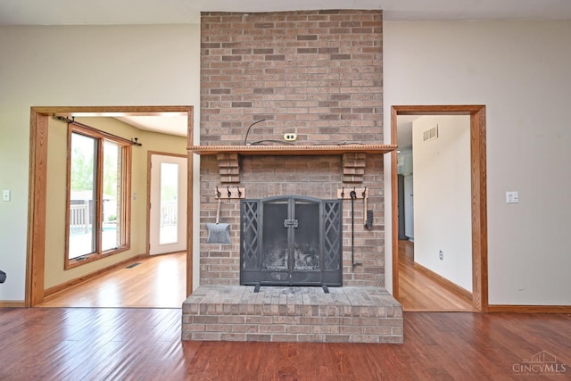 8424 Oak Grove Rd, Georgetown, OH 45121 - unfurnished living room featuring wood finished floors and baseboards