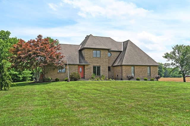 8424 Oak Grove Rd, Georgetown, OH 45121 - view of front of property with a front yard, brick siding, and roof with shingles