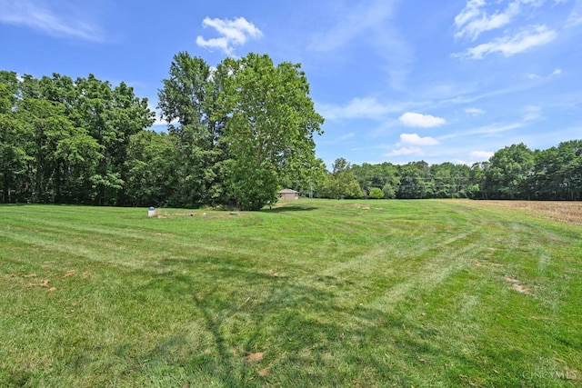 8424 Oak Grove Rd, Georgetown, OH 45121 - view of green lawn with a view of rural / pastoral area and a wooded view