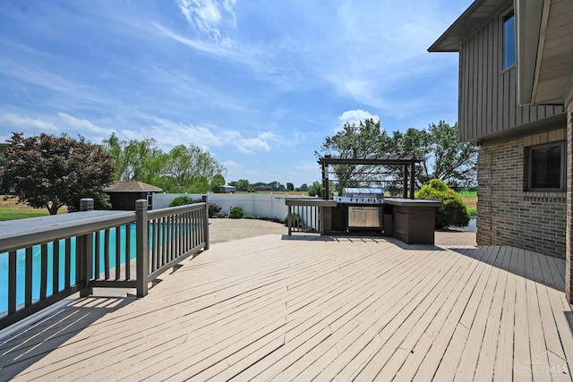 8424 Oak Grove Rd, Georgetown, OH 45121 - wooden terrace with a grill and an outdoor pool