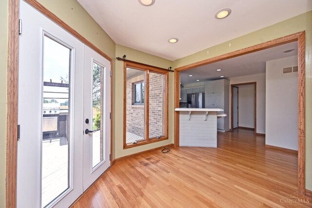 8424 Oak Grove Rd, Georgetown, OH 45121 - doorway with light wood finished floors and recessed lighting